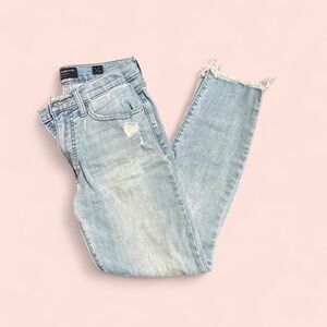 Women's Light Blue Distressed Jeans